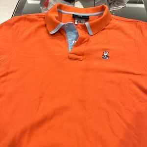 Psycho bunny, orange with gray trim small/medium size great condition